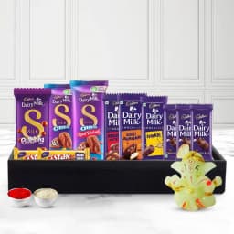 Dreamy Cadbury Delight Gift Basket with Glowing Ganesha N Roil Chawal 1