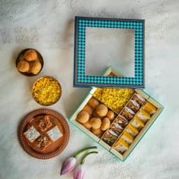 Enjoyable Assorted Kesar Sweets with Savories Treat Delight 1