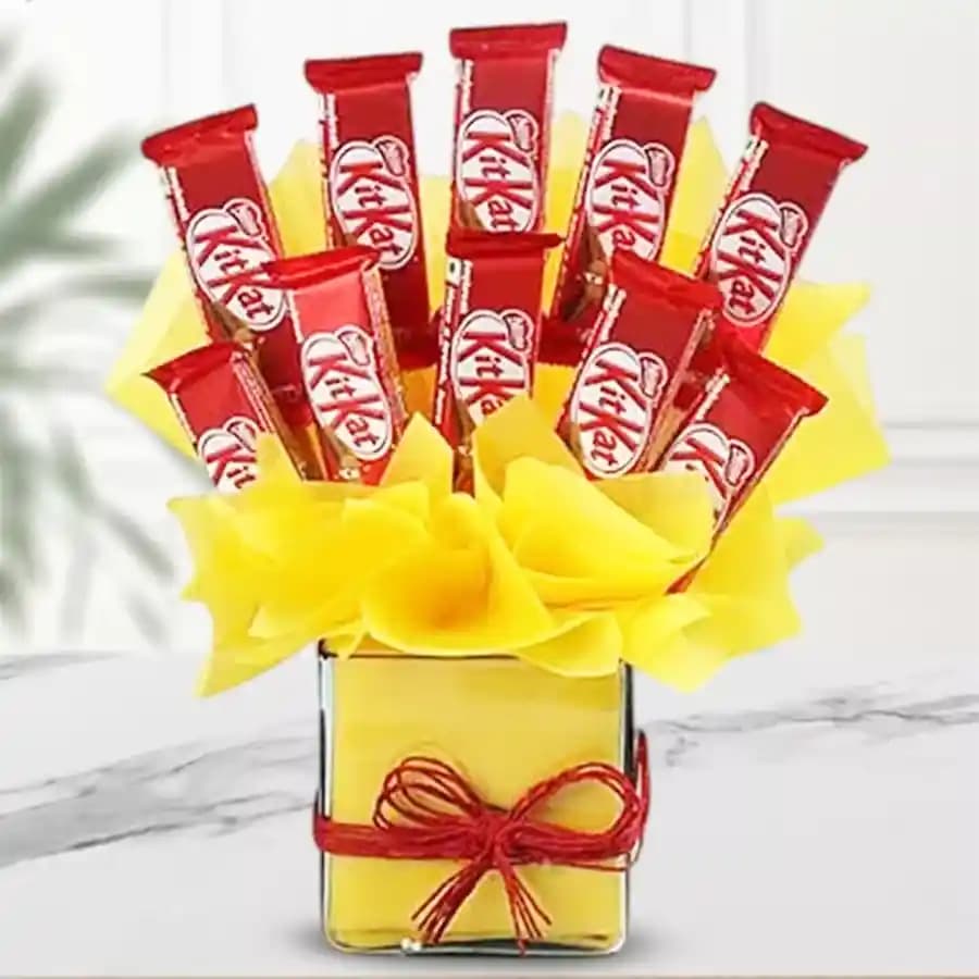 Marvelous Arrangement of Kitkat Chocolates in Glass Vase