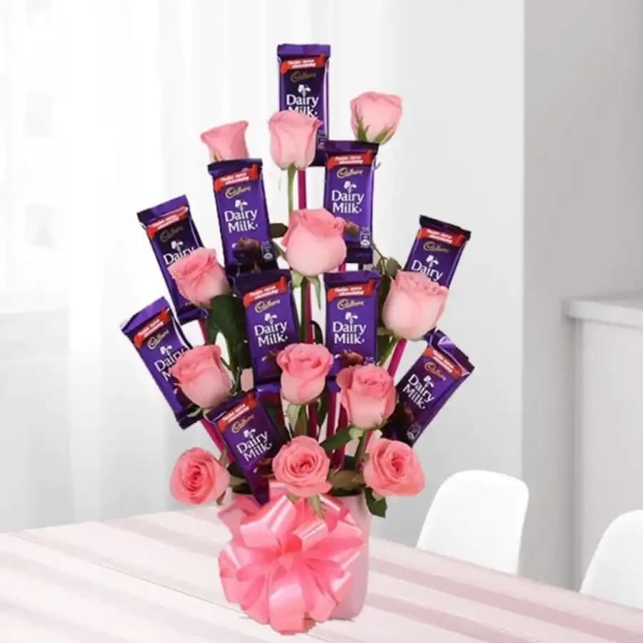 Marvelous Arrangement of Roses with Cadbury Dairy Milk Chocolates