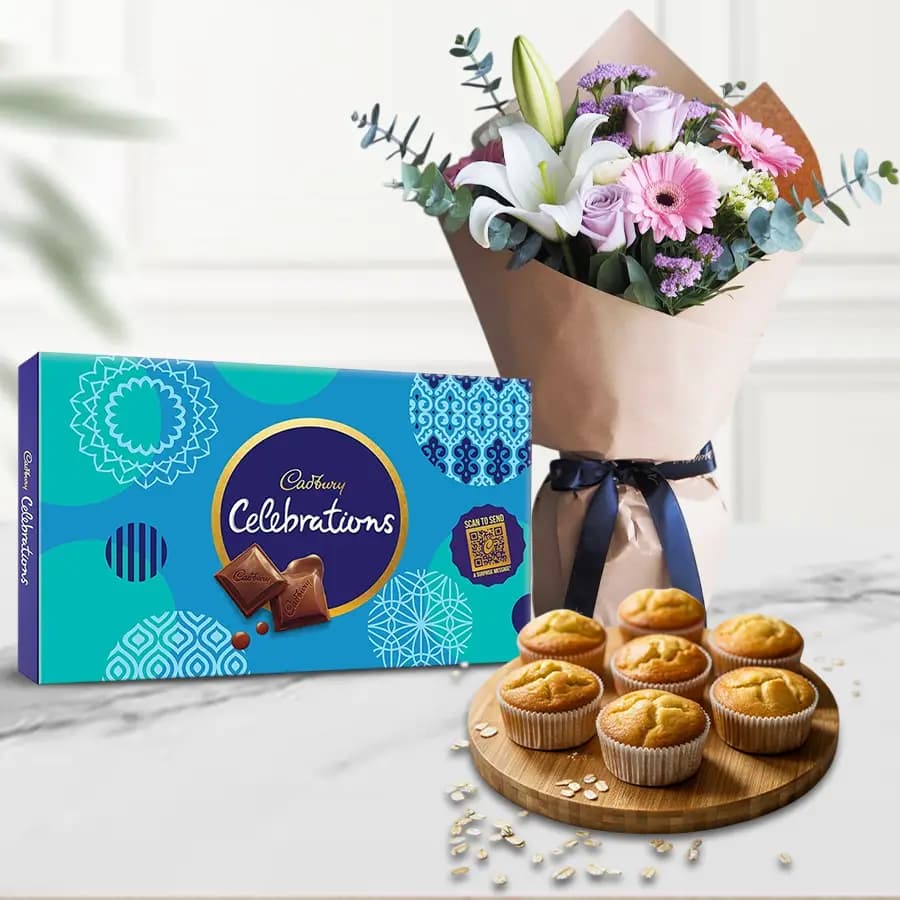Delightful X mas Gift of Muffins with Chocolates n Flowers Bouquet