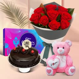 12 Exclusive Dutch Red Roses Bouquet with Cake Cadburys Assorted Chocolates and a Cute Teddy Bear(Delivery All Over India) 1
