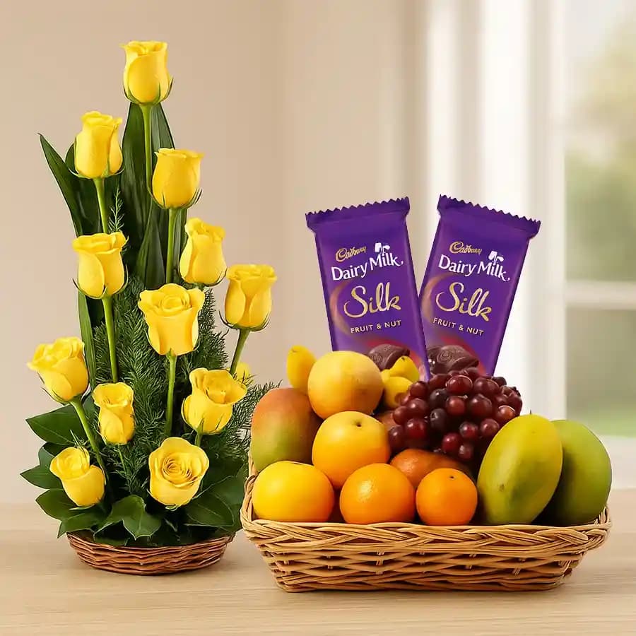 Gift of Mixed Fruits Basket with Roses Arrangement and Dairy Milk Silk