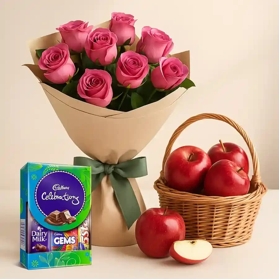 Tangy Bunch of Pink Roses with Dairy Milk Celebration and Apples Basket