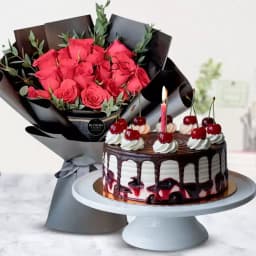 Elegant Delight: Roses, Cake, and Warm Glow 1