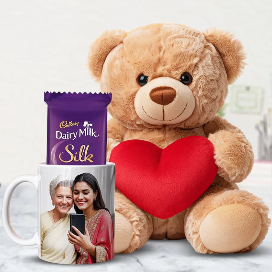 Lovely Gift of Teddy Bear with Personalized Mug N Cadbury Silk