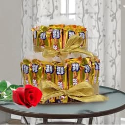 Marvelous 2 tier Arrangement of Cadbury 5 Star with Single Red Rose 1