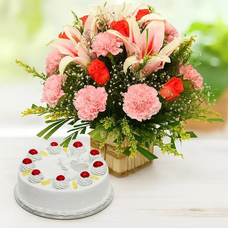 Lovely Mixed Flowers Basket N Pineapple Cake Combo