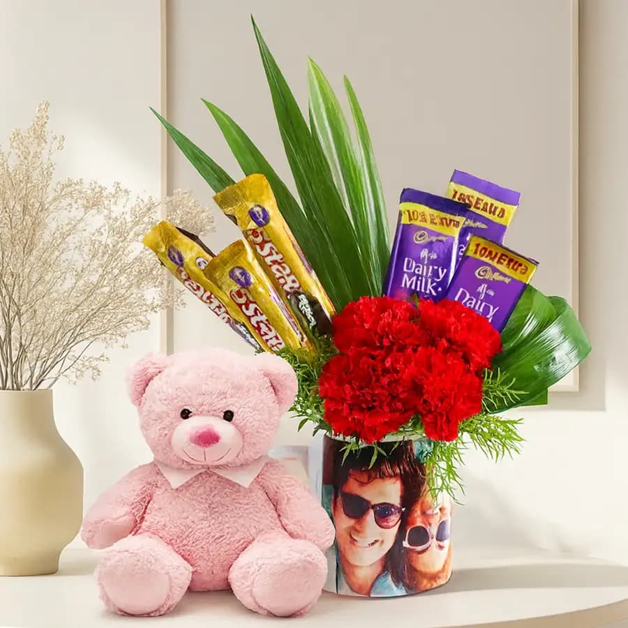 Enigmatic Carnations n Cadbury Chocolates in Personalized Picture Mug with Cute Teddy