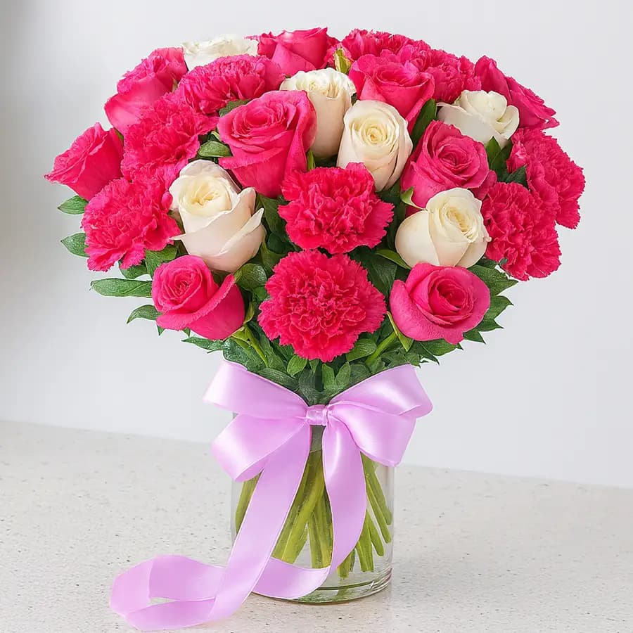 Scintillating Display of Rose and Carnations in Glass Vase