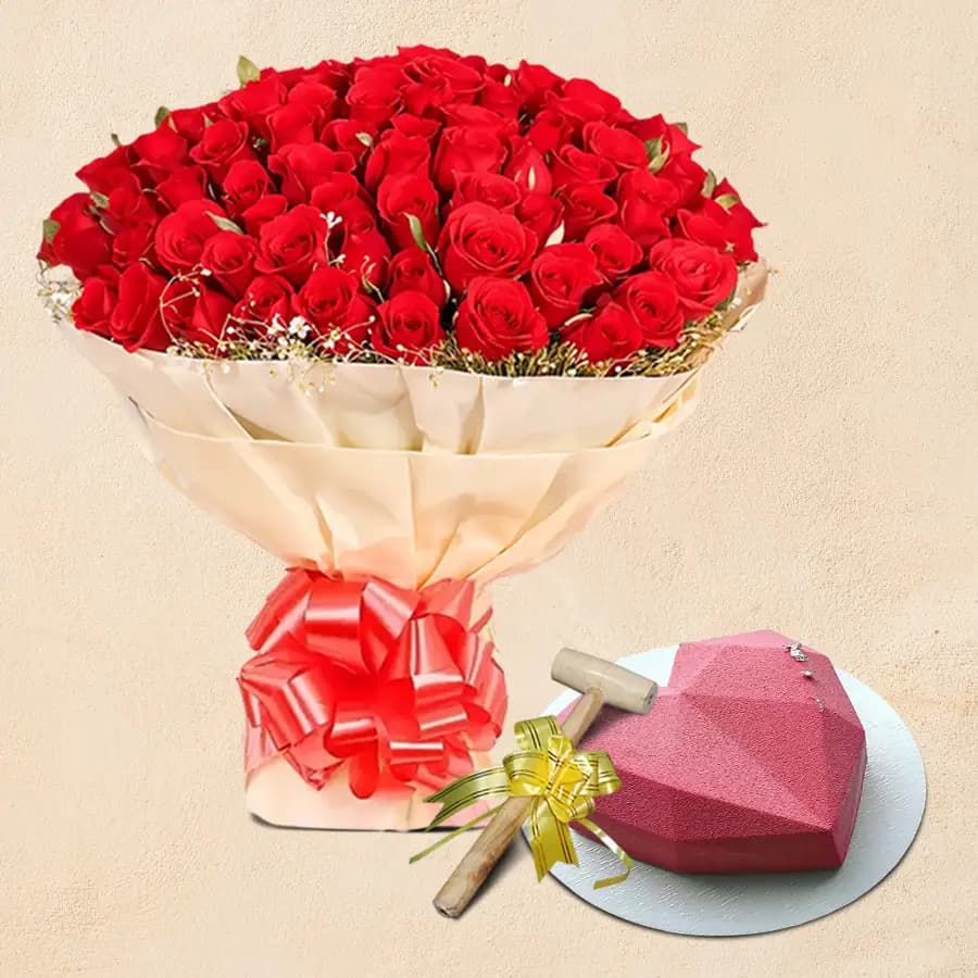 Appealing 100 Red Roses Bouquet n Heart Shape Strawberry Pinata Cake