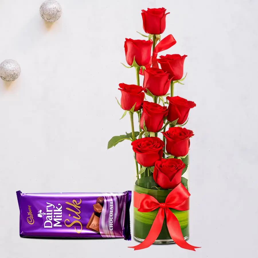 Spectacular Gift of Red Roses in Vase with Cadbury Silk Combo