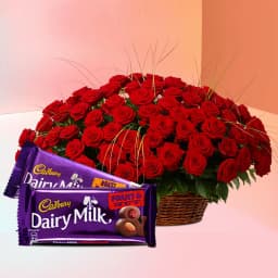 Alluring Gift of 50 Red Roses Basket with Cadbury Dairy Milk Silk 1