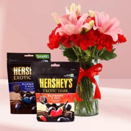 Lovely Mixed Flowers in Glass Vase with Hersheys Exotics 1
