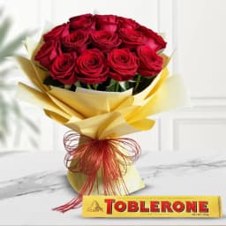 Breathtaking Red Roses Bouquet with Toblerone Exotic 1