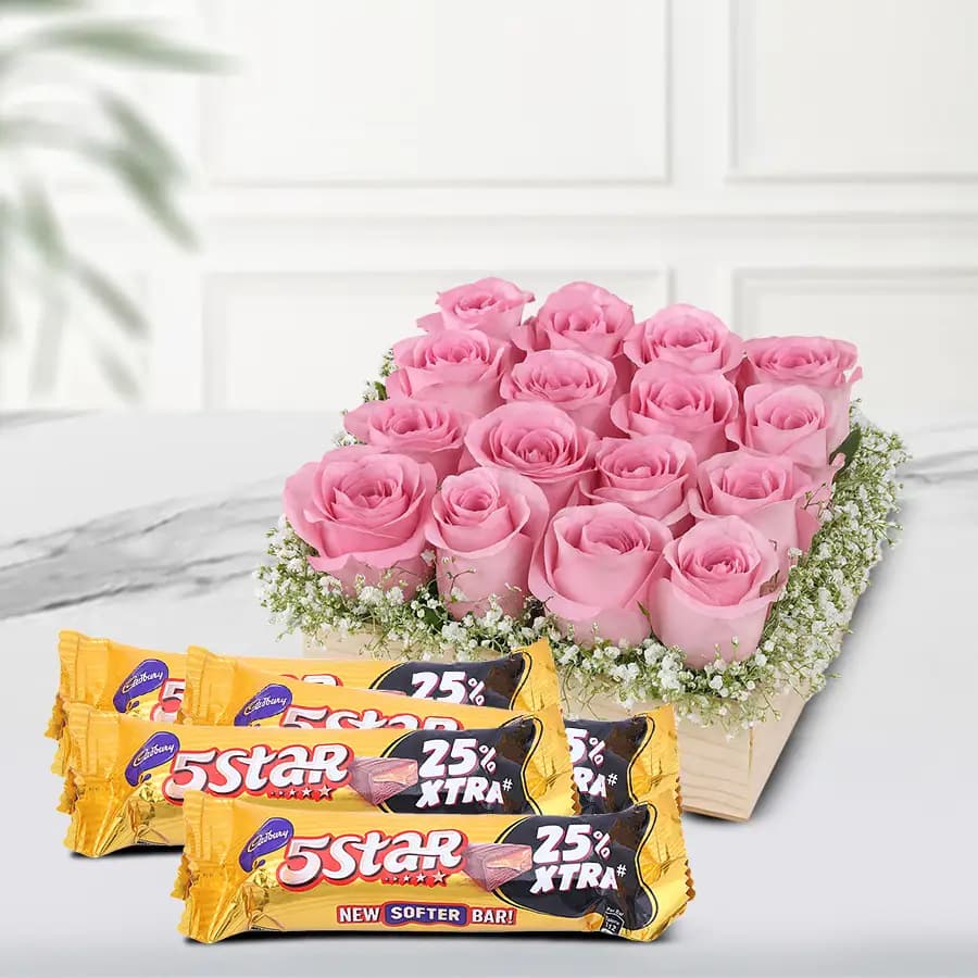 Cheerful Display of Yellow Roses in Cane Basket with Cadbury 5 Star