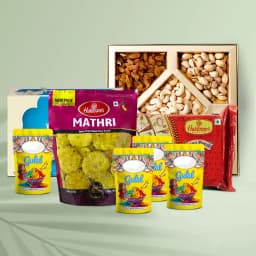Delectable Haldiram Delights N Dry Fruits Hamper with Herbal Gulal 1