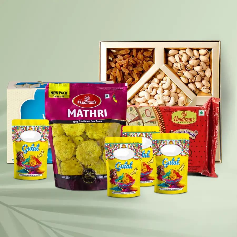 Delectable Haldiram Delights N Dry Fruits Hamper with Herbal Gulal