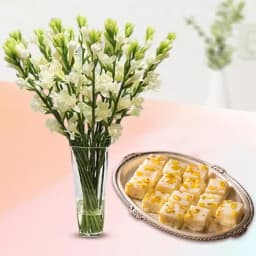 Malai Barfi with Rajanigandha Stems in a Glass Vase 1