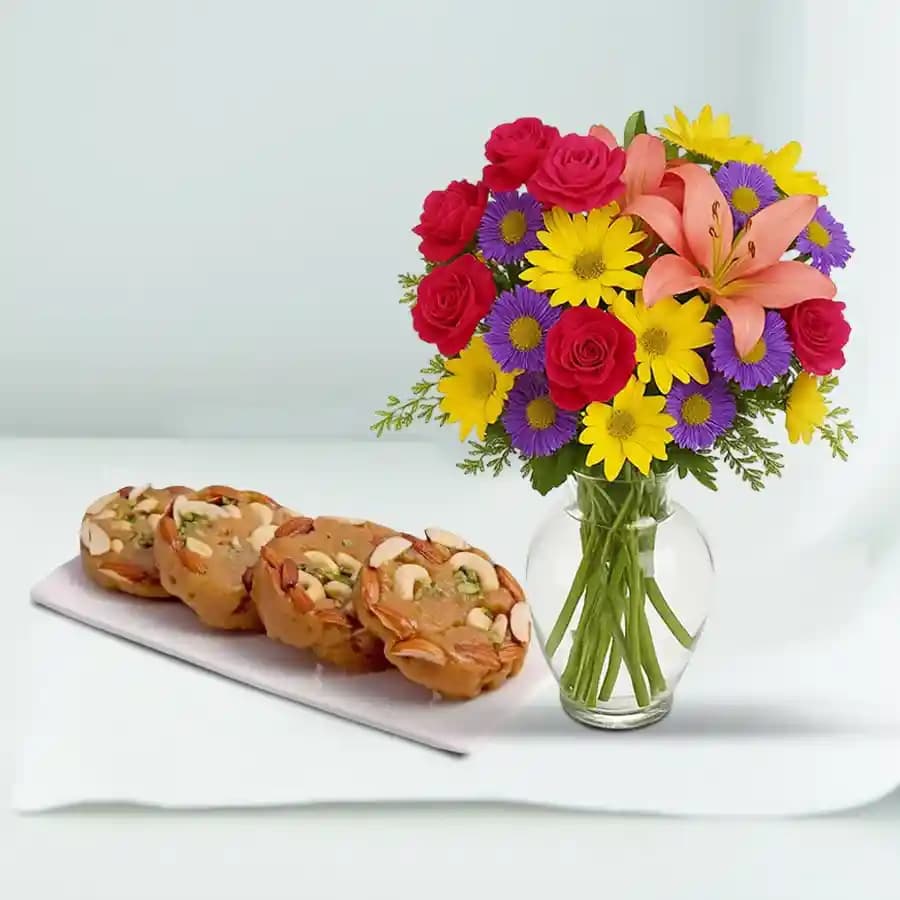 Bikanervala Halwa Sohan with Mixed Flower Arrangement