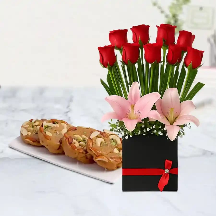 Bikanervala Halwa Sohan with a Designer Flower Arrangement