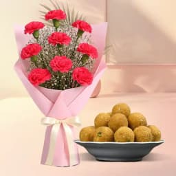 Besan Ladoo with Red Carnation Tissue Wrapped Bouquet 1