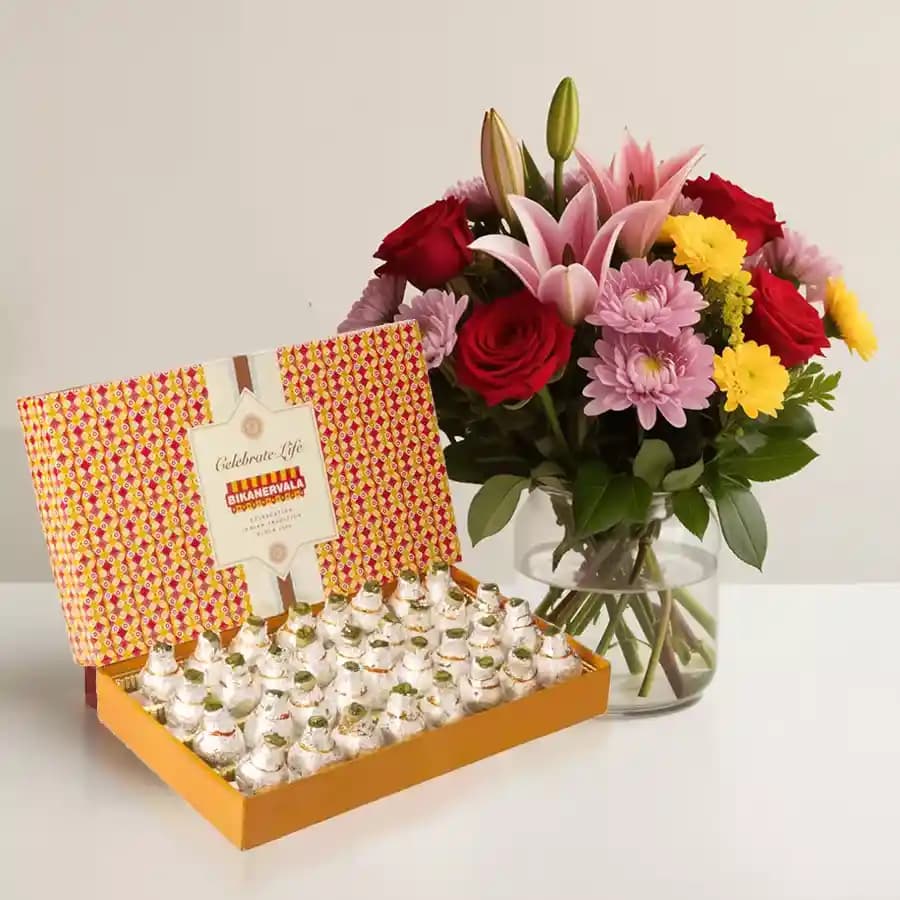 Bikanervala Kaju Kalash with Mixed Flower Arrangement