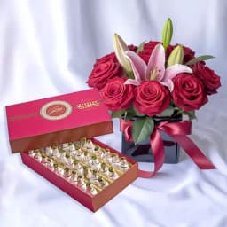 Bikanervala Kaju Kalash with a Designer Flower Arrangement 1