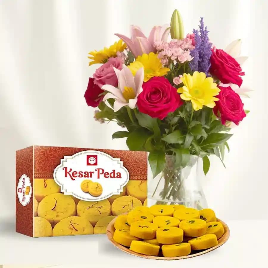 Delightful Kesar Mewa Peda and Floral Collection