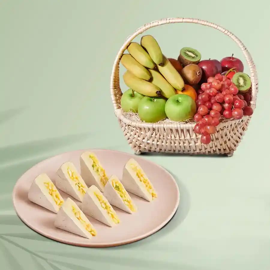 Kaju King from Shree Mithai with Fresh Fruit Basket