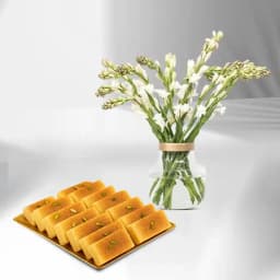 Milk Cake from Shree Mithai with Rajnigandha Stems in Glass Vase 1