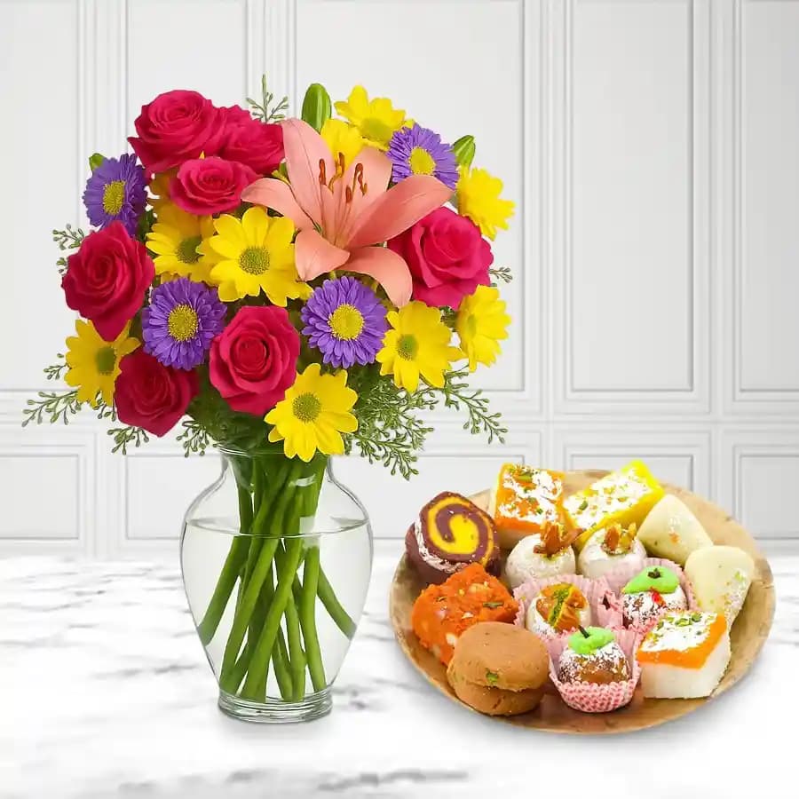 Assorted Sweets from Adyar Ananda Bhawan with Mixed Flower Arrangement