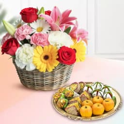 Assorted Dry Fruit Sweets from Adyar Ananda Bhawan with Mixed Flower Arrangement 1