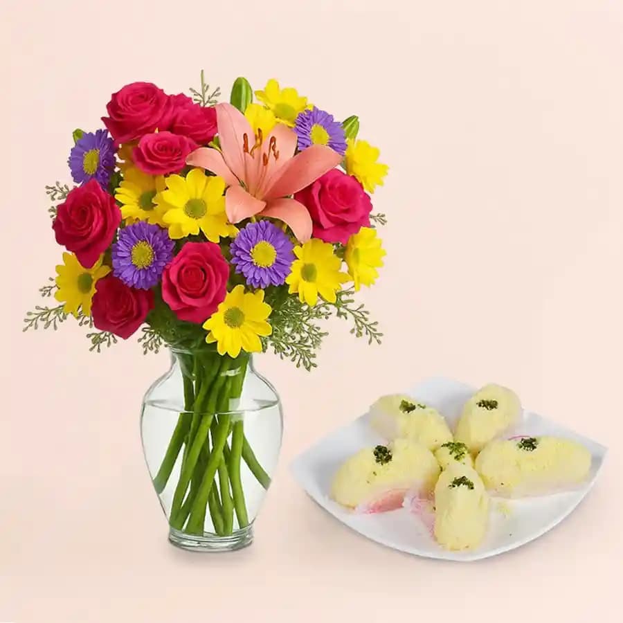 Elegant Sweet Surprise: Malai Chum Chum & Floral Arrangement