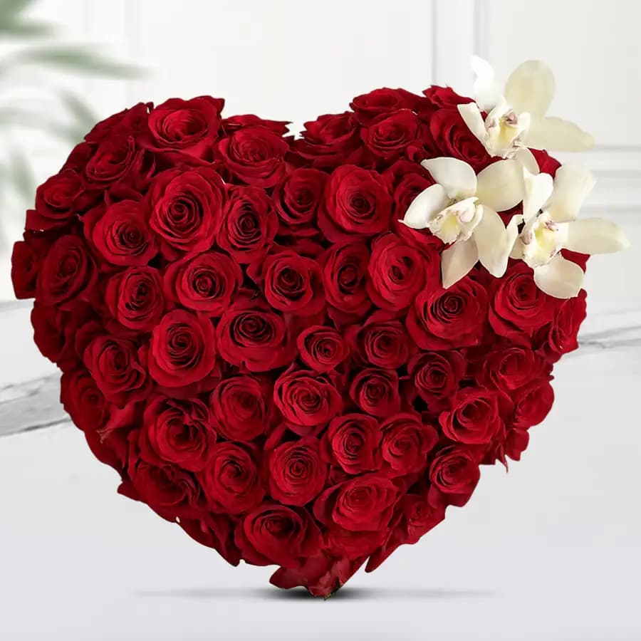 Appealing Heart Shape Arrangement of Red Roses N Lilies