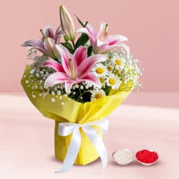 Magnificient bouquet of fresh Lilies with free Roli Tilak and Chawal 1