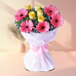 Gorgeous Tissue Wrapped Gerbera N Roses Bouquet 1