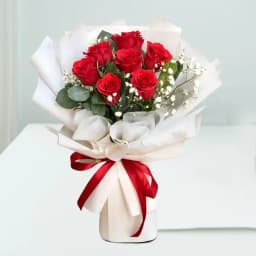 Exotic Roses Tissue Wrapped Bouquet 1