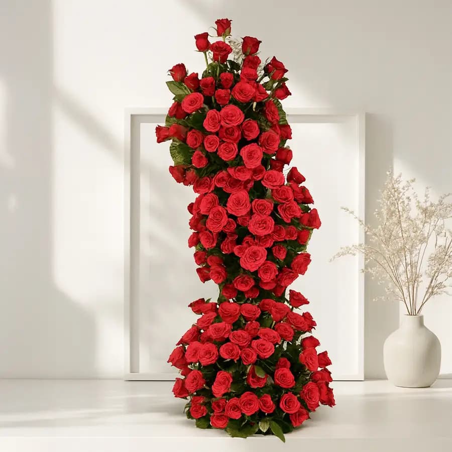 Beautifying Red Rose Arrangement (5 ft long 150 Roses)