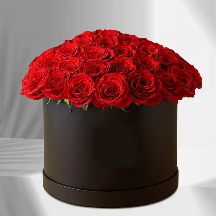 Beautiful Arrangement of Red Roses in Black Hat Box