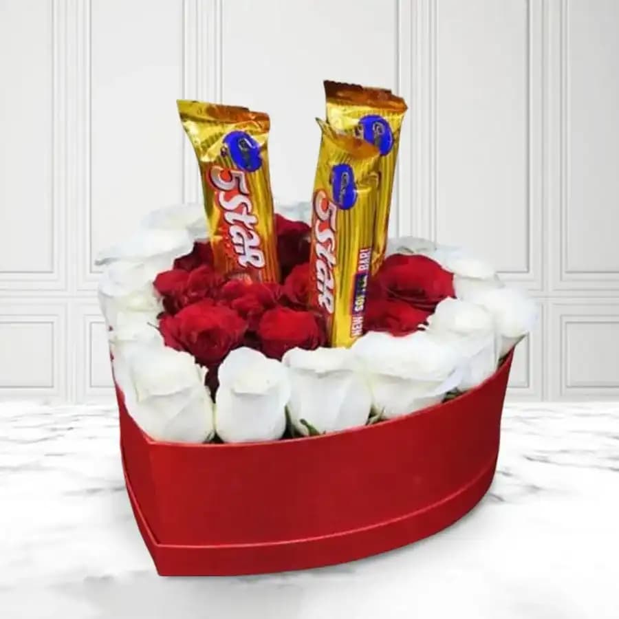 Beautiful Composition of Roses N Chocolates in Heart Box