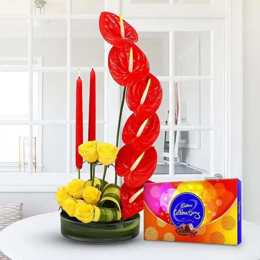 Stylish Flower Arrangement with Candles n Cadbury Celebration
