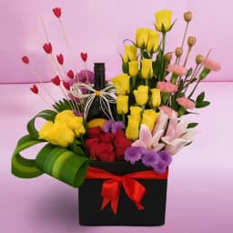 Exquisite Box Arrangement of Mixed Flowers with Sparkling Fruit Juice 1