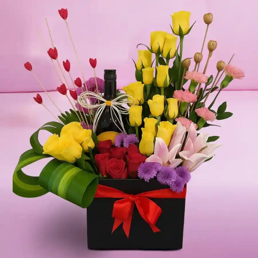 Exquisite Box Arrangement of Mixed Flowers with Sparkling Fruit Juice