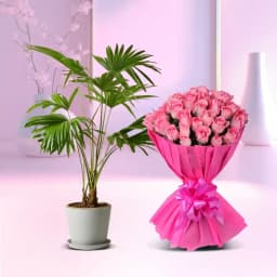 Elegant Palm Arrangement with Blush Roses 1