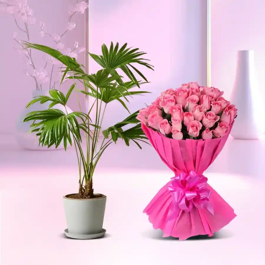 Elegant Palm Arrangement with Blush Roses