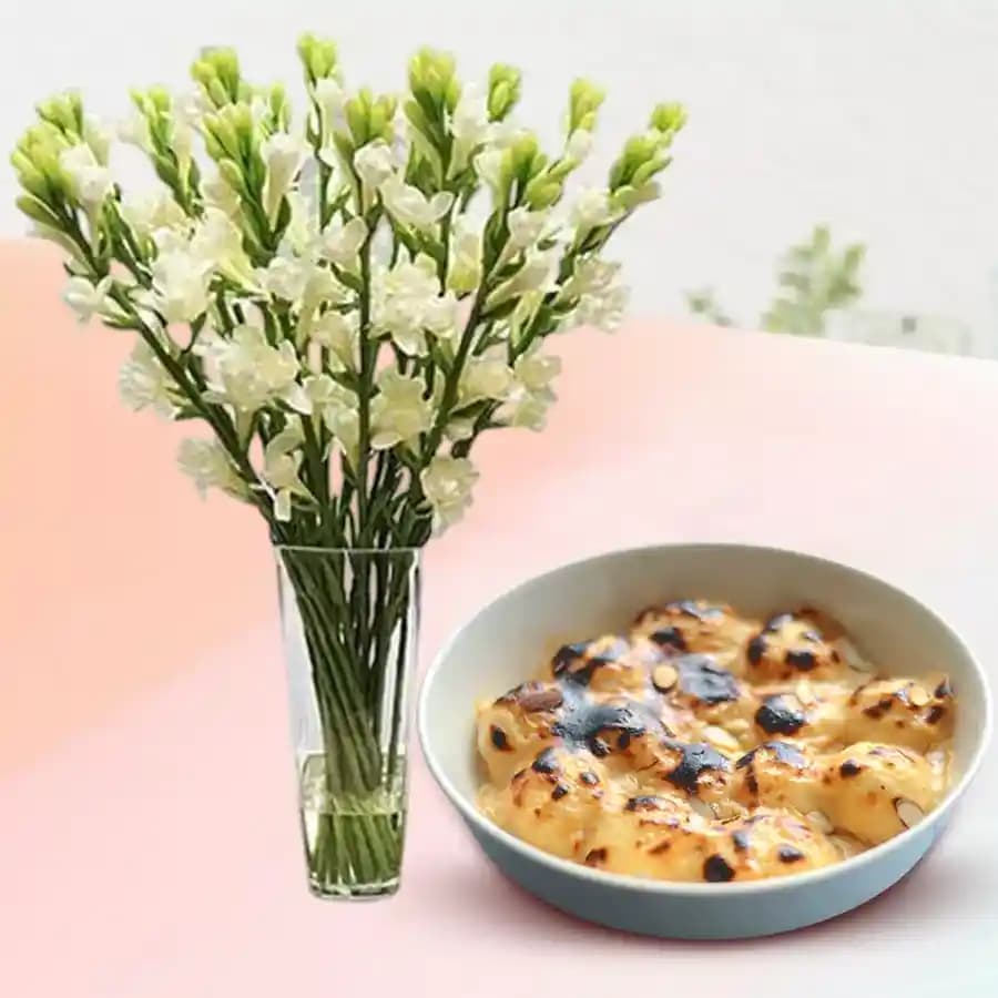 Baked Rasgulla from Balaram Mullick with Rajnigandha Stems