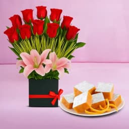 Orange Masti from Chitale Bandhu Mithaiwale with a Designer Flower Arrangement 1