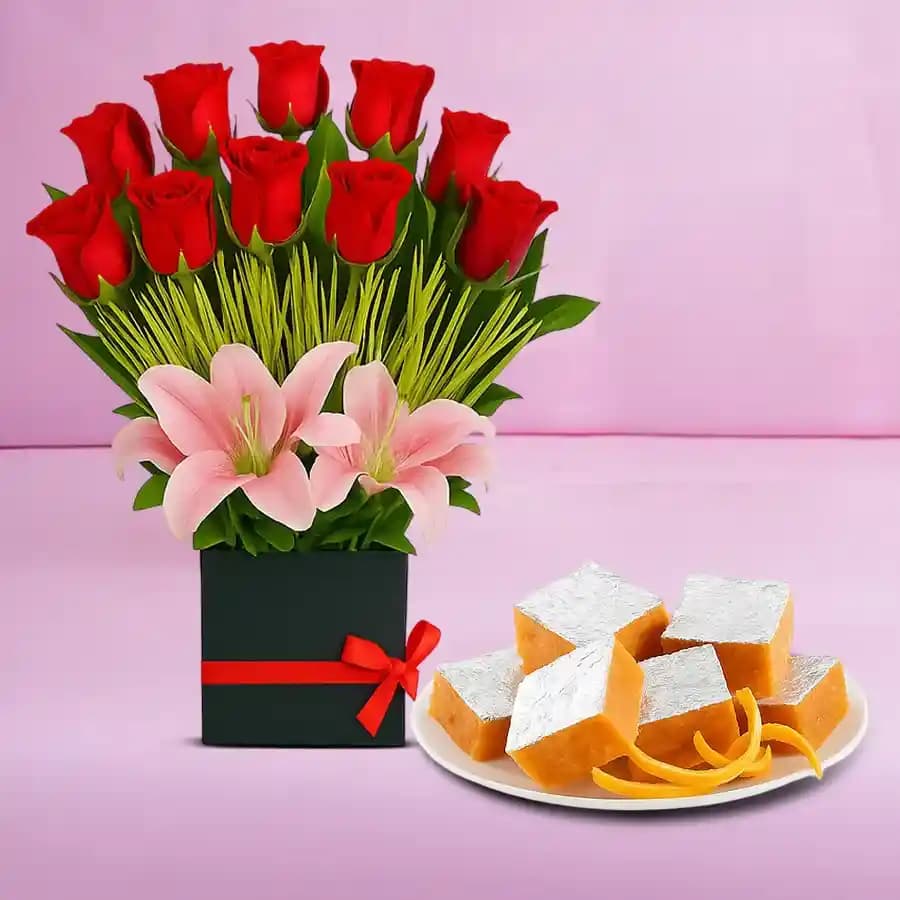 Orange Masti from Chitale Bandhu Mithaiwale with a Designer Flower Arrangement