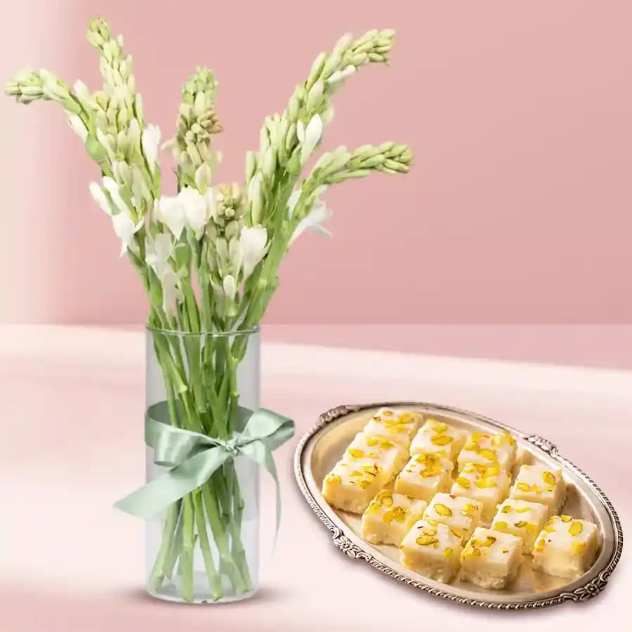 Malai Barfi from Karachi Sweet Mart with Rajnigandha Stems in Glass Vase